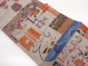 手織り紬変わり横段に花唐草・抽象模様織出し名古屋帯